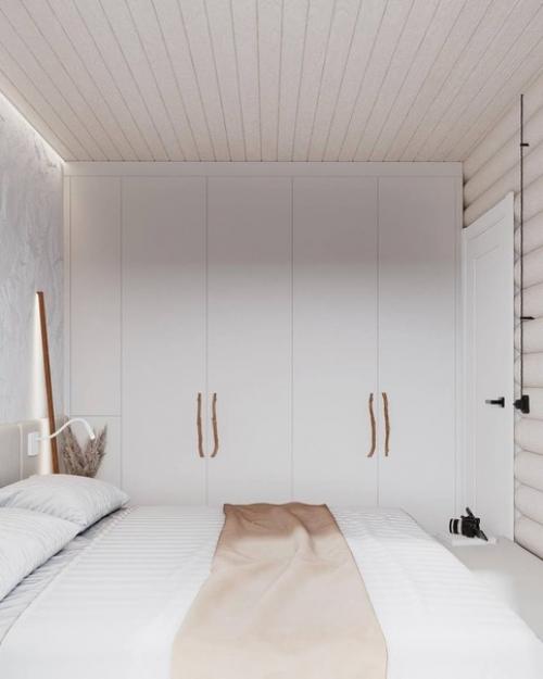 Аскетичный дизайн спальни для любителей светлых интерьеров с элементами эко стиля. 03