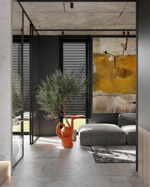 Бетон, дерево, камень, стекло и лаконичный дизайн - вот что лежит в основе этого интерьера загородного дома. 01