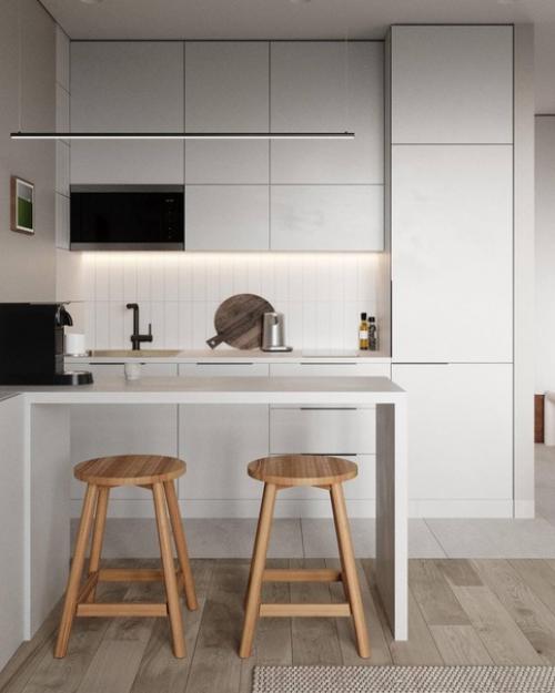 Стильный и светлый интерьер кухни - гостиной с акцентами. 01