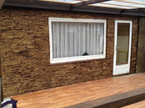 Вашему вниманию наше воплощение идеи отделки стены деревянной мозаикой. 08