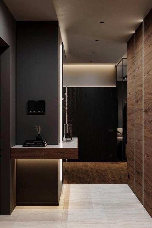 Интерьер квартиры в тёмных тонах в клубном доме в Санкт-петербурге. 01