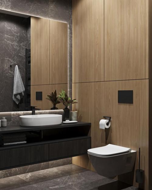 Ванная комната.  Темная плитка на полу и стенах преобладает в отделке, а шпон дуба разбавляет эту каменную текстуру. 03