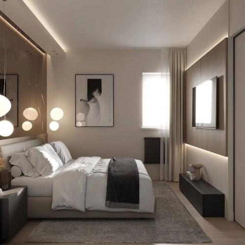 Современный интерьер спальни, который прекрасно вписывается в небольшую площадь комнаты, не перегружает пространство. 02