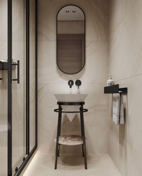 Тёплый бежевый интерьер ванной комнаты с чёрными акцентами. 03