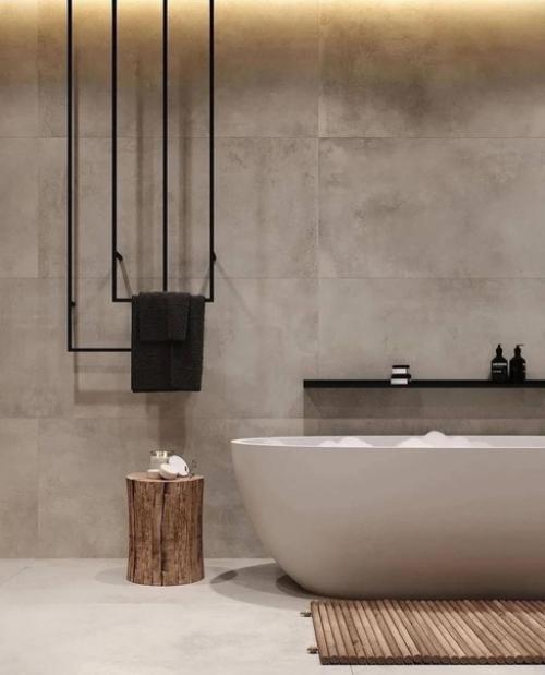 Однотонная плитка, темные аксессуары, белая ванна и продуманное освещение - вот что необходимо для элегантного и сбалансированного интерьера. 05