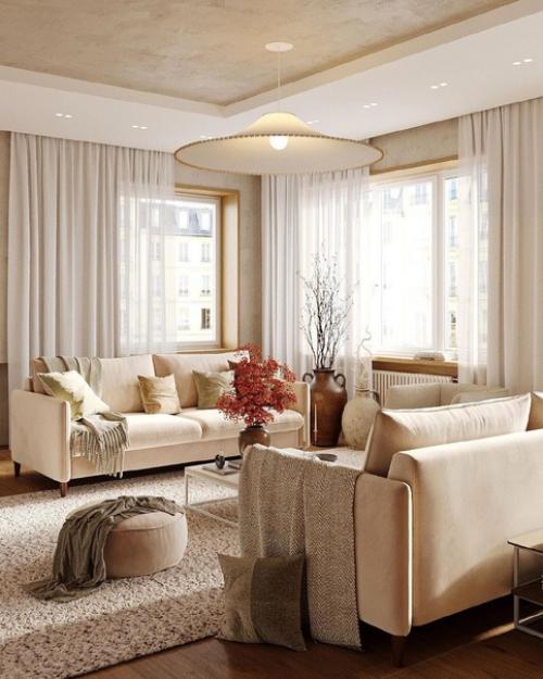 Светлая гостиная, залитая солнечным светом, так выглядит идеальная атмосфера, располагающая к отдыху и умиротворению. 02