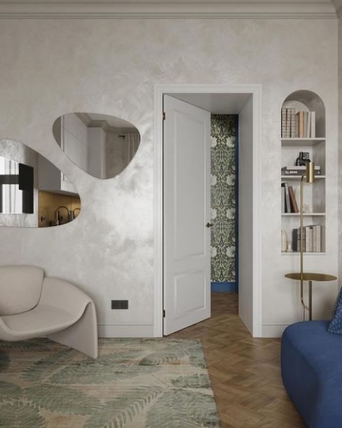 Зона гостиной.  Весь дизайн построен на контрасте четкой геометрии и округлых форм, плавных линий. 01