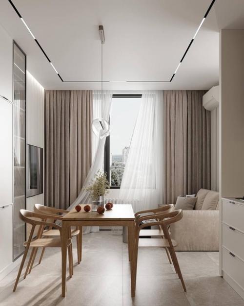 Светлый современный интерьер компактной кухни в приятной воздушной цветовой гамме. 01