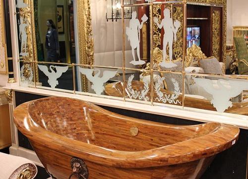 Дерево стало настолько популярным материалом, что его используют даже при отделке ванной комнаты. 05