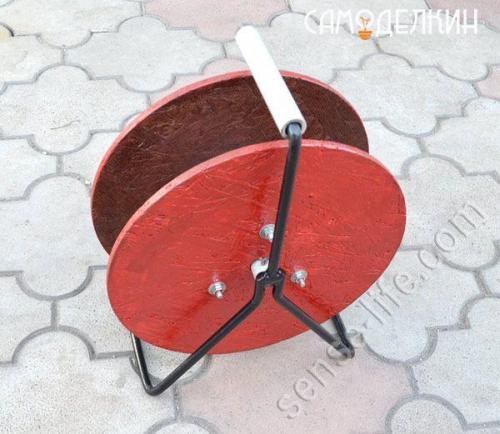 Органайзер для электрического кабеля в виде катушки. 09