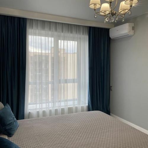 70 кв.  м. кухня - студия + 2 спальни. 04