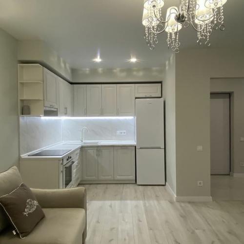 70 кв.  м. кухня - студия + 2 спальни. 02