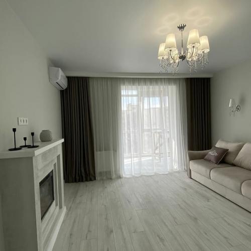 70 кв.  м. кухня - студия + 2 спальни. 01