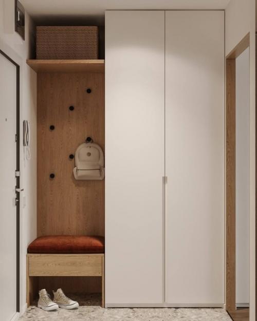 Интересный проект, который включает в себя прихожую и кухню - гостиную. 07