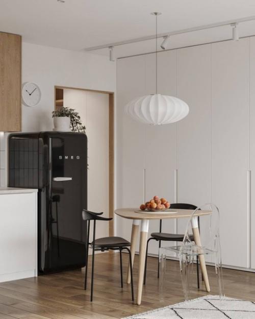 Интересный проект, который включает в себя прихожую и кухню - гостиную. 06