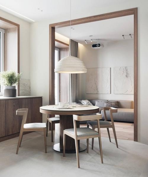 Интерьер кухни гостиной впечатляет своей светлой и лаконичной концепцией. 01