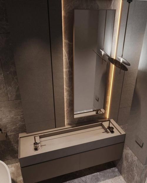 В ванной создали спокойную и расслабляющую атмосферу. 03