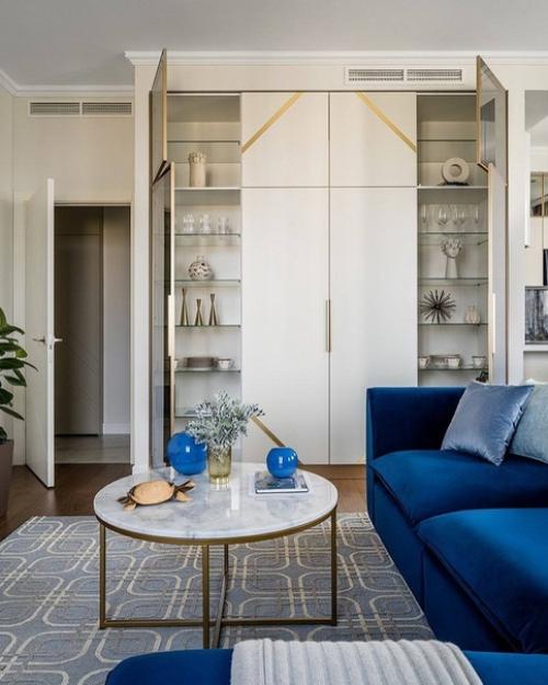 Стильный и гармоничный интерьер однокомнатной квартиры с яркими насыщенными акцентами. 04