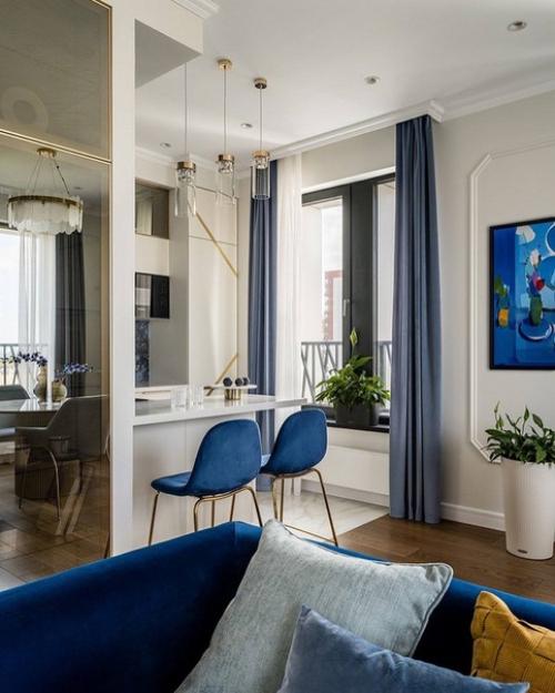 Стильный и гармоничный интерьер однокомнатной квартиры с яркими насыщенными акцентами. 03