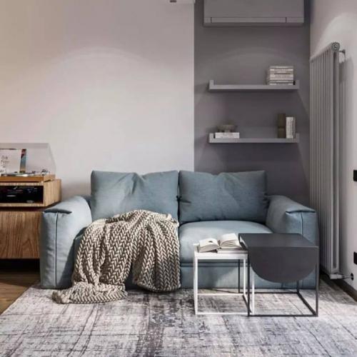 Простые геометрические формы, контрасты и натуральные оттенки делают интерьер этой комнаты стильным и дорогим. 01