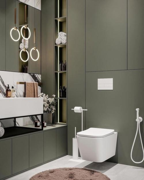 Активный контрастный мрамор, нежный оливковый и щепотка латуни - 3 ключевых составляющих в невероятно крутой ванной от студии Neapol Design. 01