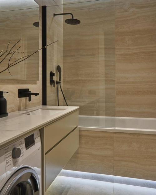 Светлый санузел в теплой гамме с большим количеством мест скрытого хранения. 05