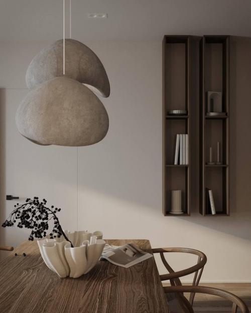 Интерьер лаконичной прихожей и кухни - гостиной площадью 26 квадратных метров в светлом исполнении. 07