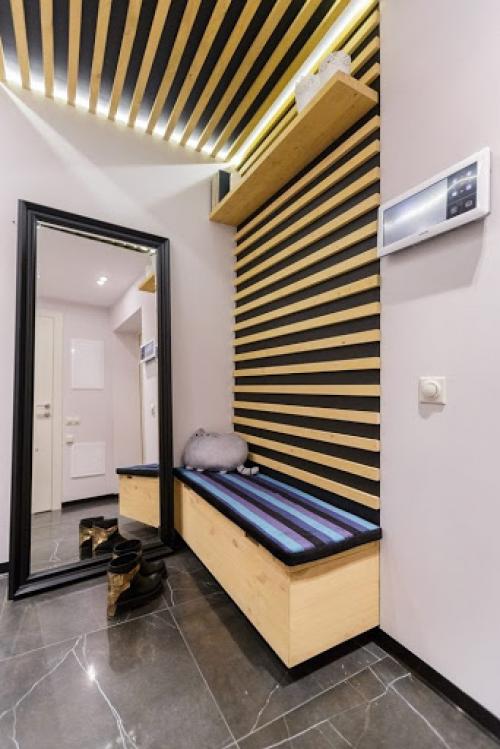 Из декоративных реек (баффелей) можно сделать перегородку или оригинальную акцентную зону на стене или даже на потолке. 08