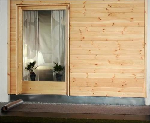 Как правильно защитить и покрасить фасад деревянного дома. 02