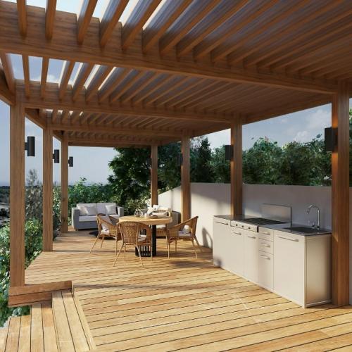 Просторная терраса становится продолжением дома и главным местом для общения и отдыха. 04