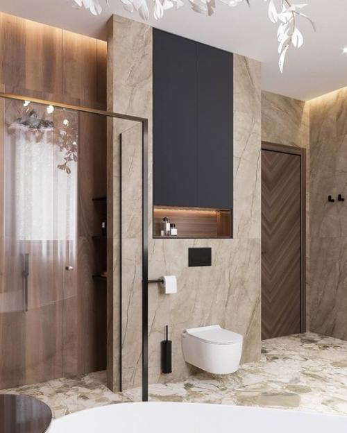 Уютный светлый интерьер просторного санузла с отдельностоящей ванной. 02