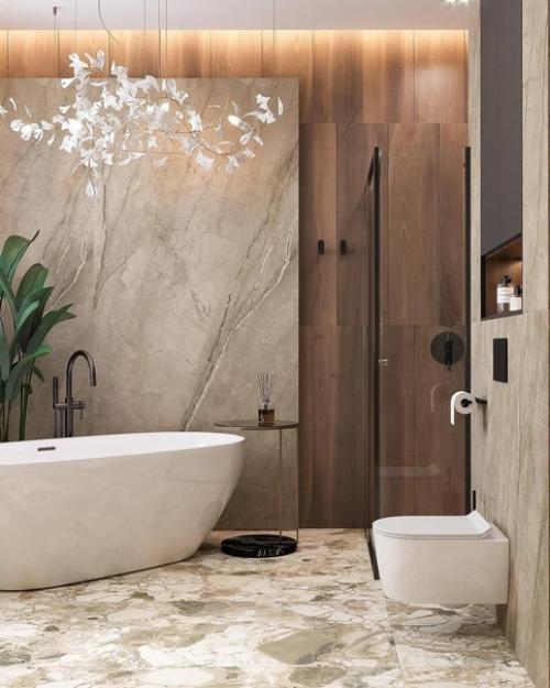 Уютный светлый интерьер просторного санузла с отдельностоящей ванной. 04