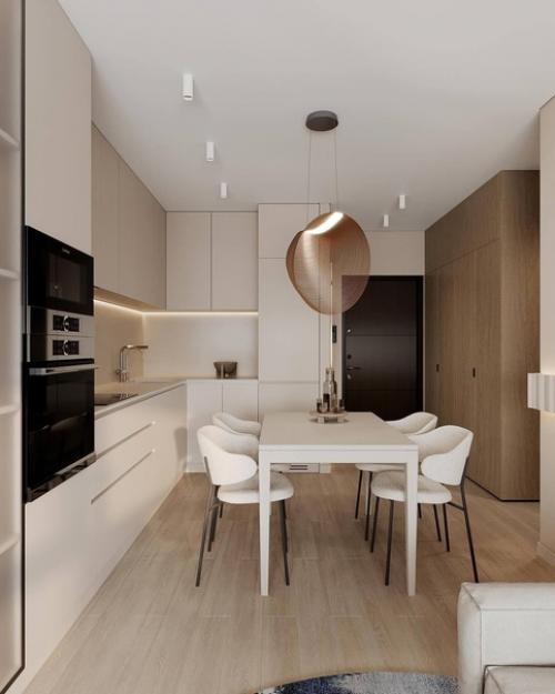 Интерьер кухни - гостиной в теплых тонах создает приятную и уютную атмосферу, идеальную для семейного отдыха и приема гостей. 01