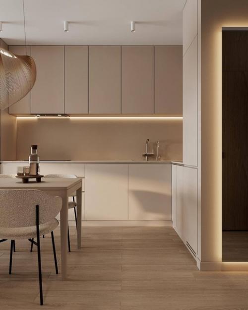 Интерьер кухни - гостиной в теплых тонах создает приятную и уютную атмосферу, идеальную для семейного отдыха и приема гостей. 06