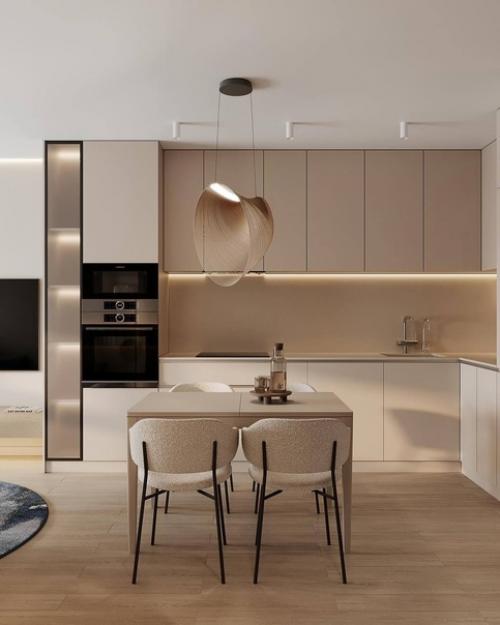 Интерьер кухни - гостиной в теплых тонах создает приятную и уютную атмосферу, идеальную для семейного отдыха и приема гостей. 02