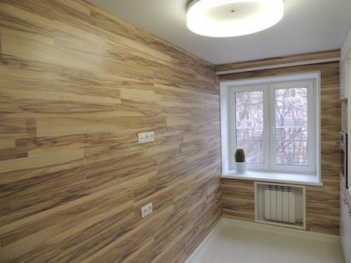 Посмотрите, какая интересная отделка стен кухни ламинатом. 03