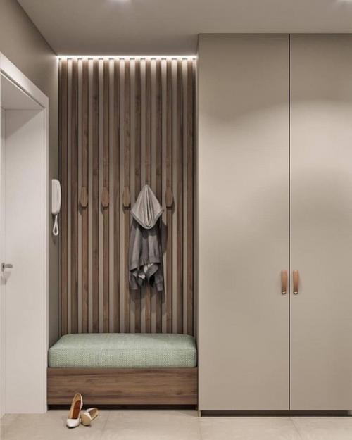 Интерьер квартиры, выполненный в спокойных тонах, помогает создать атмосферу уюта и спокойствия. 09