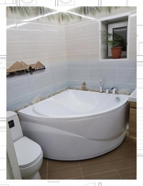 Угловая ванна в интерьере помогает оптимально использовать пространство санузла без ущерба для эстетики помещения и комфорта её владельца. 01