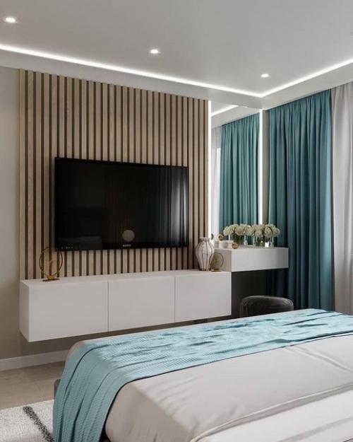 Интерьер квартиры, выполненный в спокойных тонах, помогает создать атмосферу уюта и спокойствия. 08