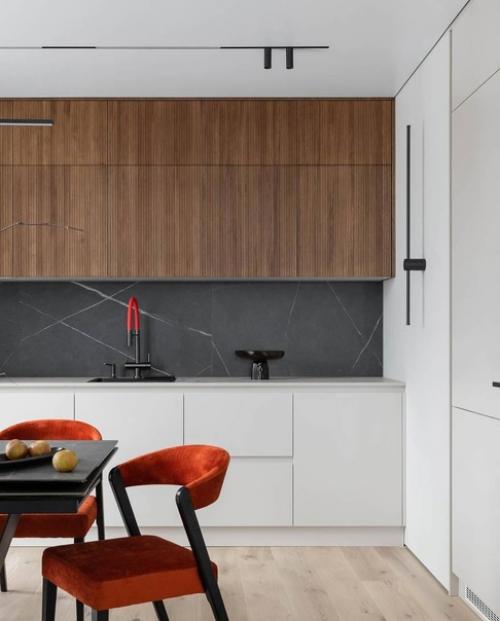 Интерьер получился очень пластичным, все элементы и линии взаимодействуют между собой, выстраивая плавные переходы из одной формы в другую. 06