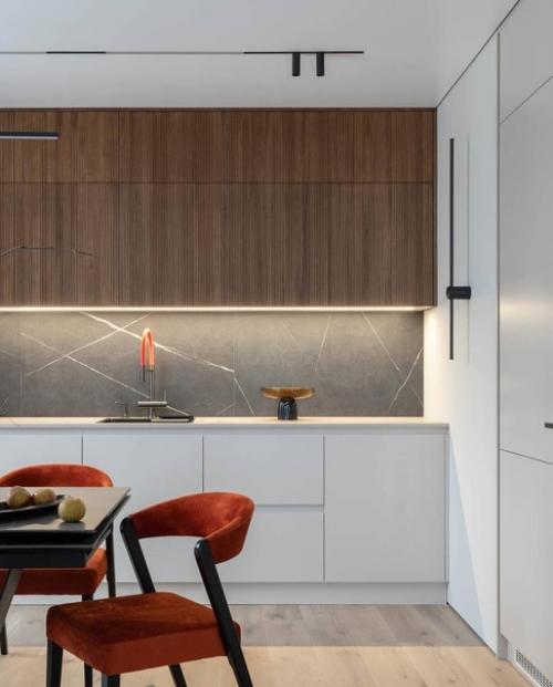 Интерьер получился очень пластичным, все элементы и линии взаимодействуют между собой, выстраивая плавные переходы из одной формы в другую. 01