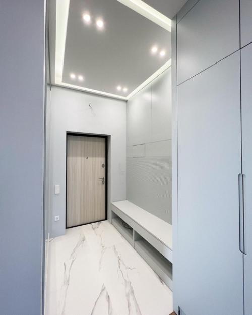 Мебель выполнена в том же оттенке, что и стены. 02