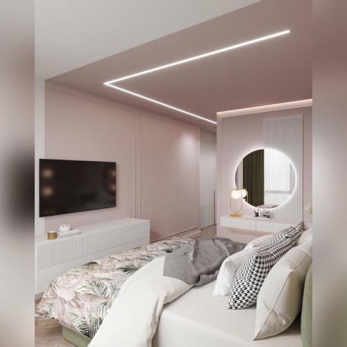 Мягкие пастельные тона, бархатистый зелёный и припыленный розовый, использование геометрии делают дизайн спальни уютным и изысканным. 05